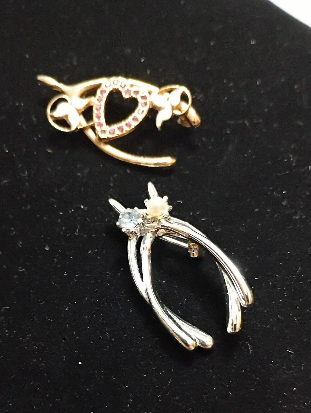 2 Wishbone Brooches